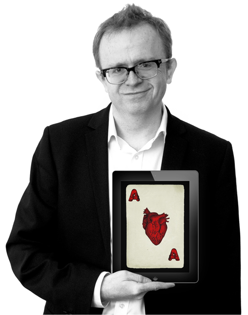 iPad magician NOEL QUALTER holds holds an iPad showing an anatomically correct Ace of Hearts over his real heart